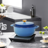 HAOYYE Cast Iron 7.5QT Cooking Pot Gradient Blue Color with Enamel Coating Includes Two Silicone Gloves Heavy Duty Durable Multi-Purpose Dutch Oven for Stovetop Oven and Outdoor Cooking Perfect for Stews Soups and Casseroles