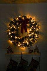 HAOYYE Pre-Lit Christmas Wreath with Remote Battery Powered Warm Lights Snow Flocked Artificial Xmas Wreath with 180 PVC Tips and Decorative Ornaments for Front Door Wall Gate Porch Holiday Party Décor