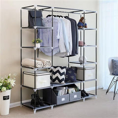 DE Direct HAOYYE Portable Clothes Closet Wardrobe Storage Organizer with Non-Woven Fabric Cover Strong Steel Frame and 12 Shelves Freestanding Garment Rack Dustproof and Waterproof Fabric Quick and Easy Assembly for Bedroom Entryway Black